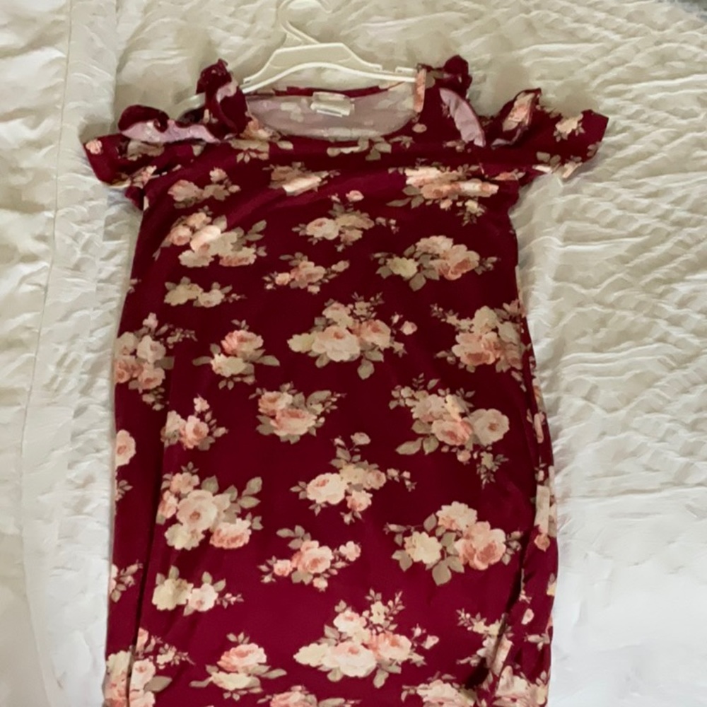 This is a red dress with white flowers